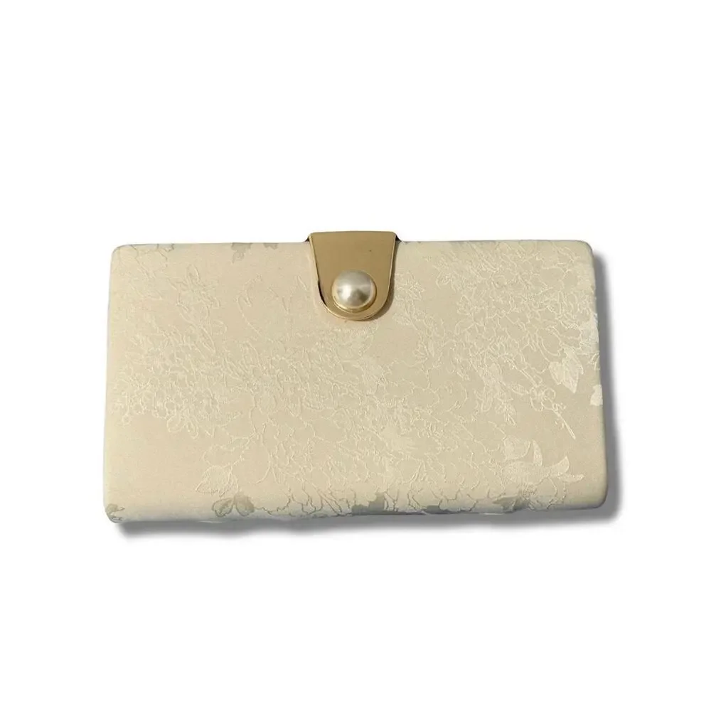 Estee & Lilly cream and white floral clutch bag with gold and pearl accents